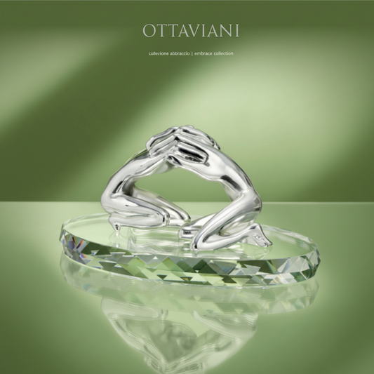 Scultura abbraccio in argento e cristallo di Ottaviani 